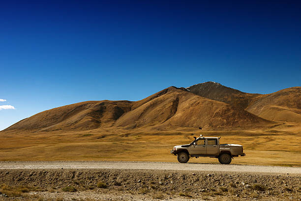 istock Car SUV on the mountains background 611611450
