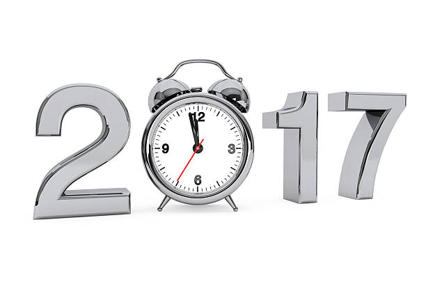 istock New Year 2017 concept. 2017 Steel Sign with Alarm Clock. 611611508