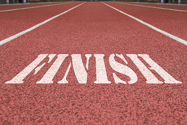 istock finish written on the red running track 611614580