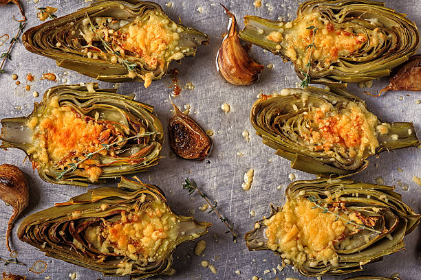 istock Artichokes baked with cheese, garlic and thyme. 611615776