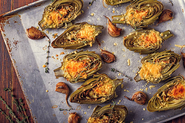 istock Artichokes baked with cheese, garlic and thyme. 611615858