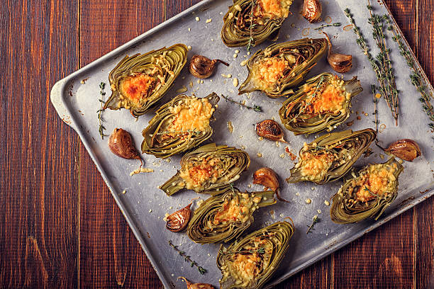 istock Artichokes baked with cheese, garlic and thyme. 611615962