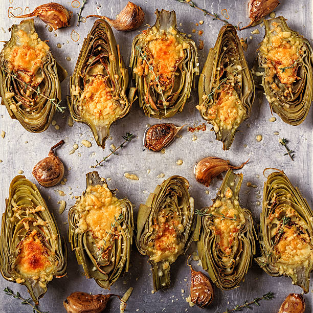 istock Artichokes baked with cheese, garlic and thyme. 611616010
