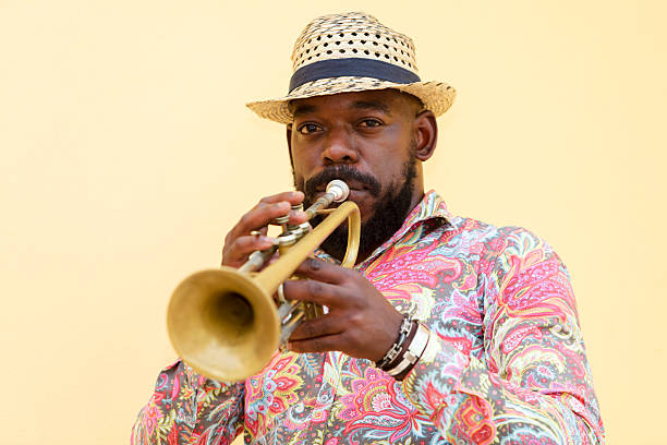 istock Cuban musician playing trumpet, Havana, Cuba 611618366