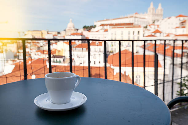 istock Cup of coffee and Lisbon cityscape 611618654