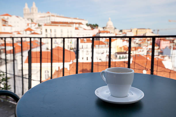 istock Cup of coffee and Lisbon cityscape 611619654