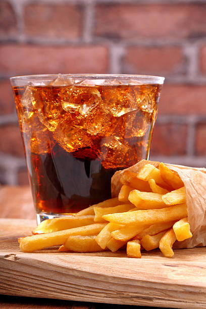istock French fries and coke with ice 611623544