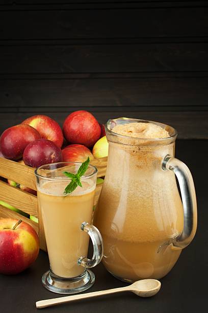 istock Fresh pressed apple juice unfiltered. 611623850