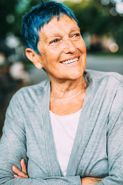 istock Happy senior woman 611625402