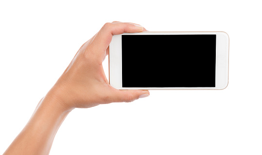 Female hand taking photo with smart phone isolated on white background.   