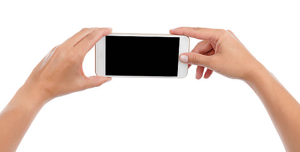 istock Taking Photo or Selfie with Cell Phone Isolated 611628330