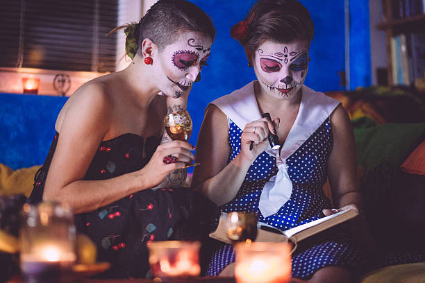 istock Fun of Reading Horror Stories on Helloween 611632370
