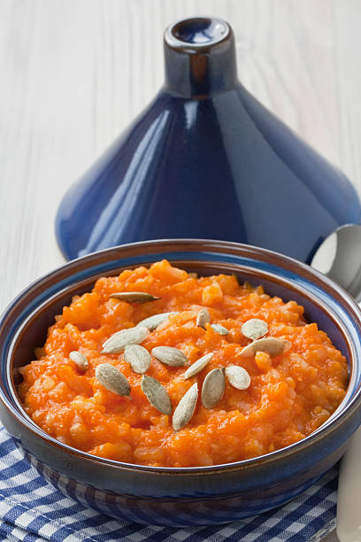 Pumpkin risotto with seeds stock photo