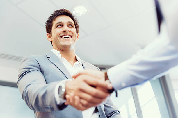 istock Handshake of businessmenoncepts - soft focus 611634572