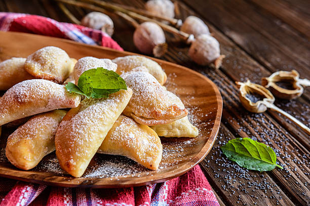 istock Sweet baked dumplings stuffed with poppy seeds 611634714