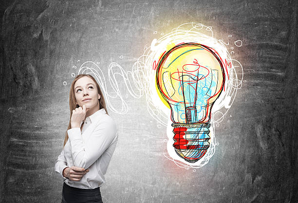 istock Woman in shirt finding great business idea 611635114