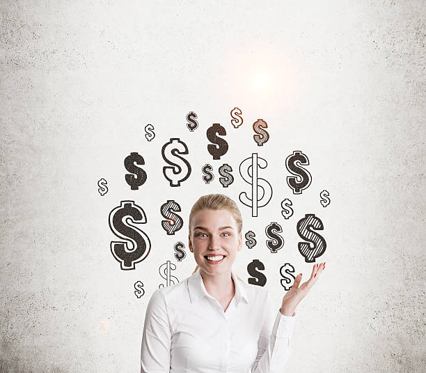 istock White shirt girl and dollar signs 611635372