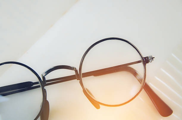 istock Artwork in retro style, Spectacles and book , vintage styled 611636752