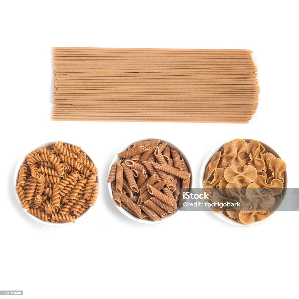 Pasta integral. Espaguetis, Penne y Fusilli - Foto de stock de Pasta libre de derechos