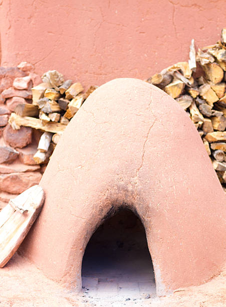 Santa Fe Style: Outdoor Adobe Horno Oven Santa Fe style: An outdoor abobe horno oven. Shot in Santa Fe, NM. adobe oven stock pictures, royalty-free photos & images