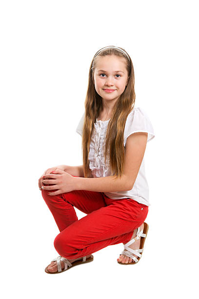 istock Eleven years girl is sitting in studio 611750934