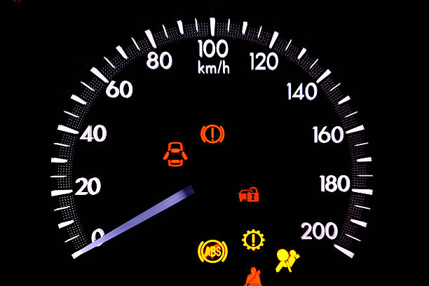 istock warning lights in the car on black background 611752774