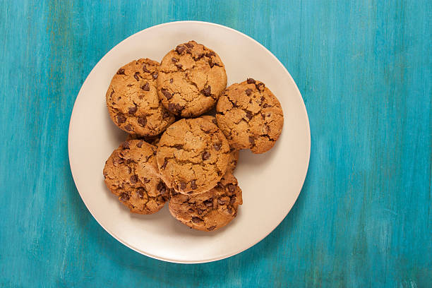 istock Plate of freshly baked chocolate chips cookies, with copyspace 611753372