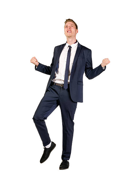 istock Happy young businessman raised fists 611755026