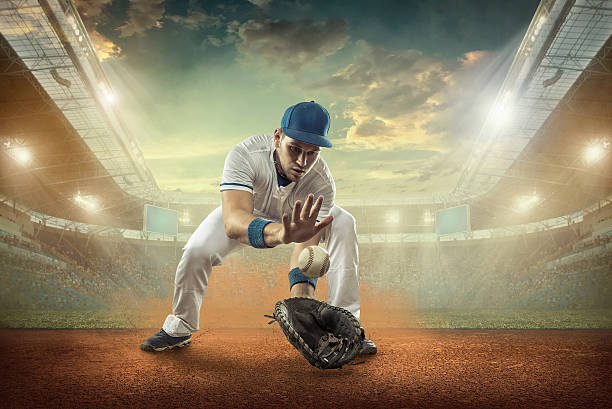 istock Baseball players in action on the stadium. 611755496