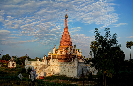 Stupa near Maha Aungmye Bonzan temple at sunset, Ava, Myanmar