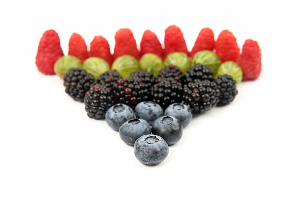 istock raspberries, gooseberries, blackberries and blueberries 611756734