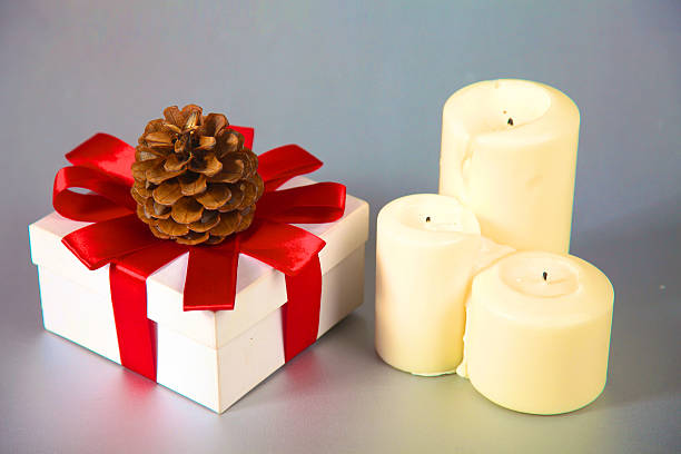 istock cute smiling snowman on sidin Christmas present 611759296