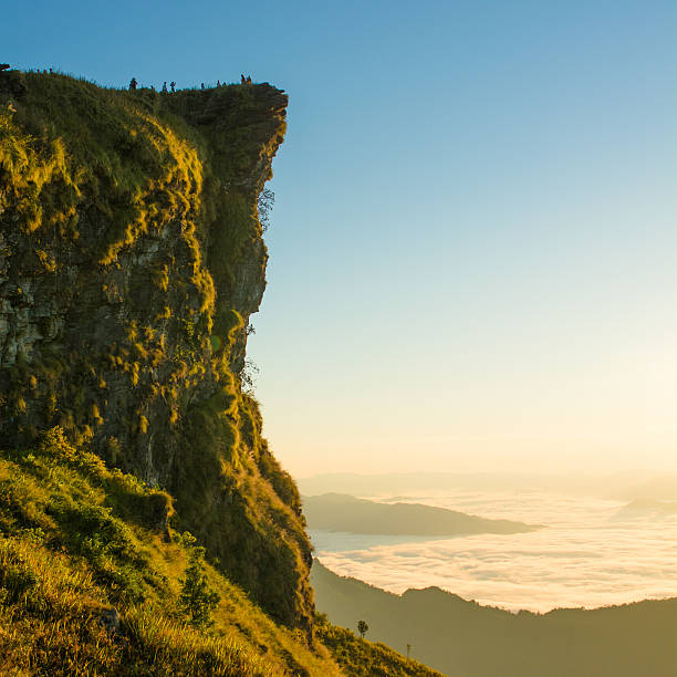 istock Panoramic view misty morning sunrise in mountain at north Thailand 611759928