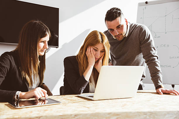 istock getting assistance in the office boardroom 611761434