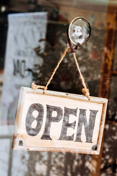 istock open sign broad through the glass 611761736