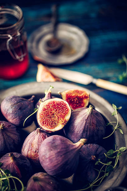 istock Figs and Sweet Honey on Wooden Background 611761806