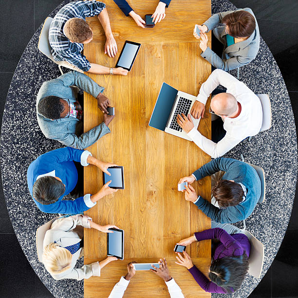istock Group of Business People Using Digital Devices Concept 611762698