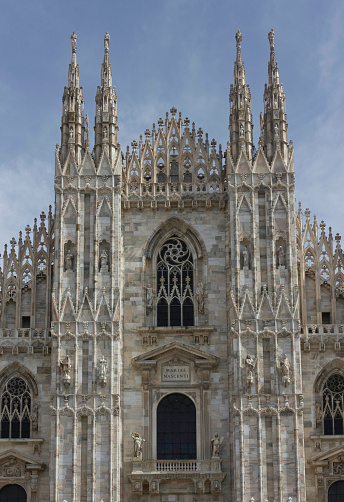 Milan, Italy - April 14, 2015: Architectural view of Milano Duomo cathedral, landmark of the city, close up with nobody