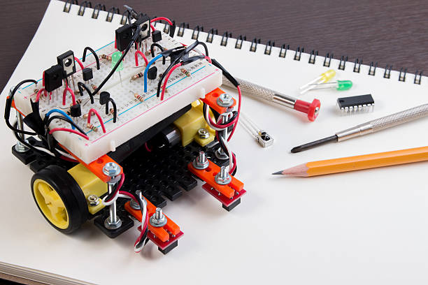 istock DIY Electronic Kit , Line tracking robot competition ideas. closeup. 611764500