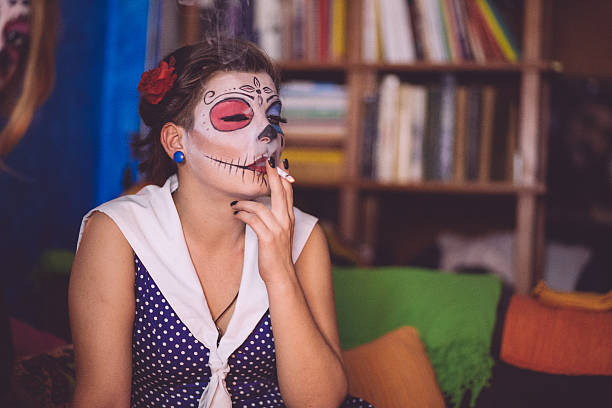 istock Sugar Skull Pin ups are most sensual when smoking 611765484