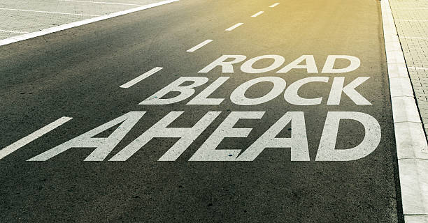 istock Road block ahead message on the highway lane 611765962
