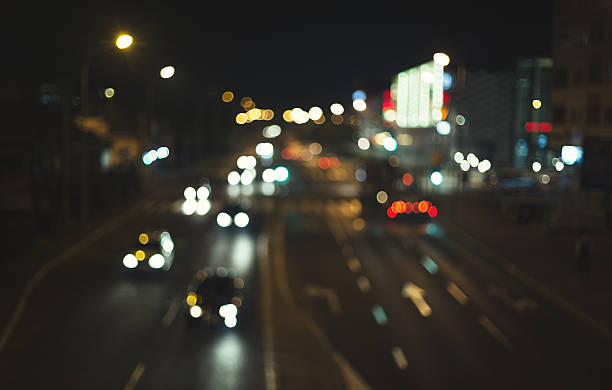 istock Defocused crossroad traffic 611765994