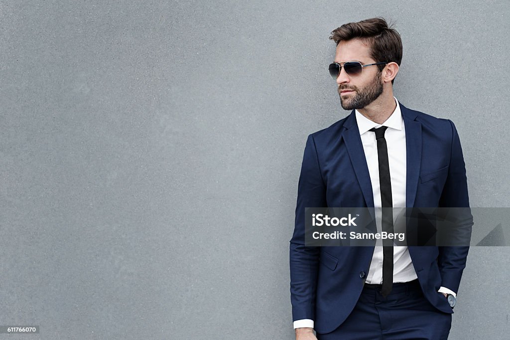 Business guy on gray Business guy on gray background, looking away 30-34 Years Stock Photo