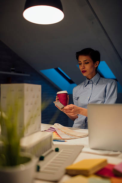 istock Young Businesswoman Drinking Coffee In Her Office. 611766892