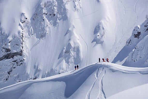 istock Snowboard freeride, snowboarders and tracks on a mountain slope. Extreme 611766898