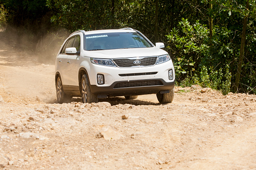 Hoabinh, Vietnam - Jun 3, 2014: Kia New Sorento car is running on the mountain road in test drive, Vietnam.