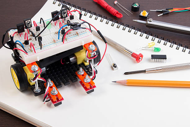 istock DIY Electronic Kit , Line tracking robot competition ideas. closeup. 611770072