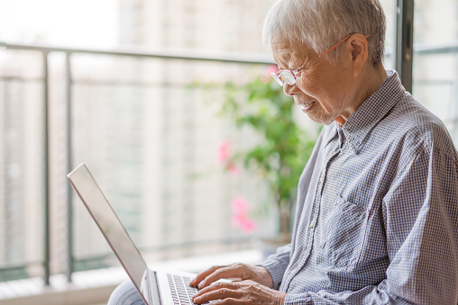 Senior Woman Using a Laptop