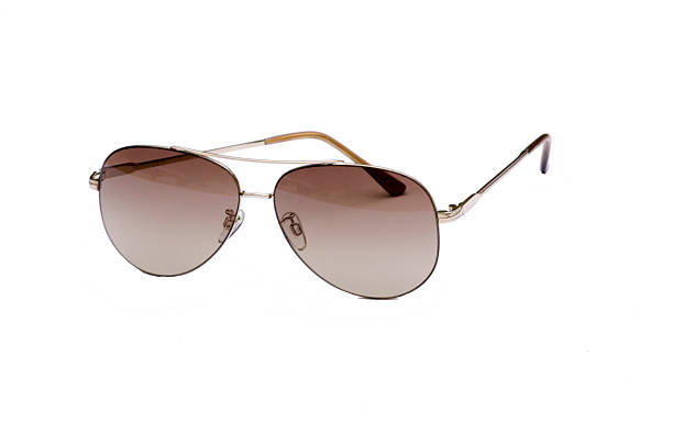 istock Close up of aviator sunglasses isolated on white background 611772552