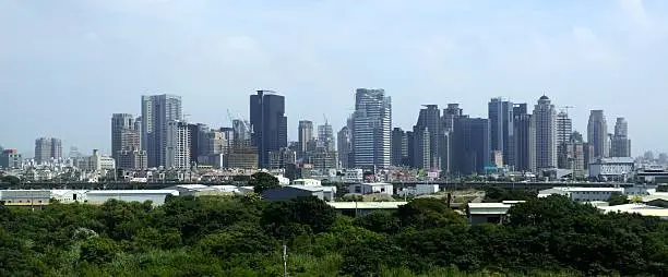 Taichung City skyline, a major city located in center-western Taiwan. Taichung has a population of over 2.7 million people, making it the third largest city on the island after New Taipei City and Kaohsiung.